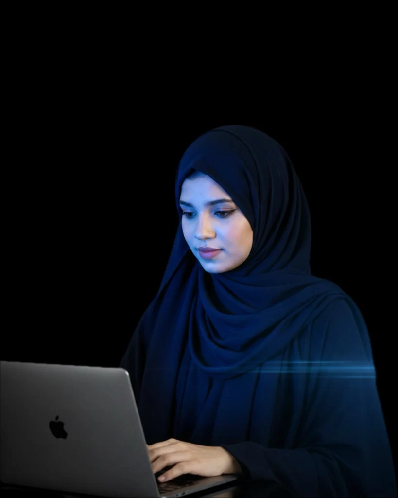 jumana hannath digital marketing freelancer in dubai working on a laptop